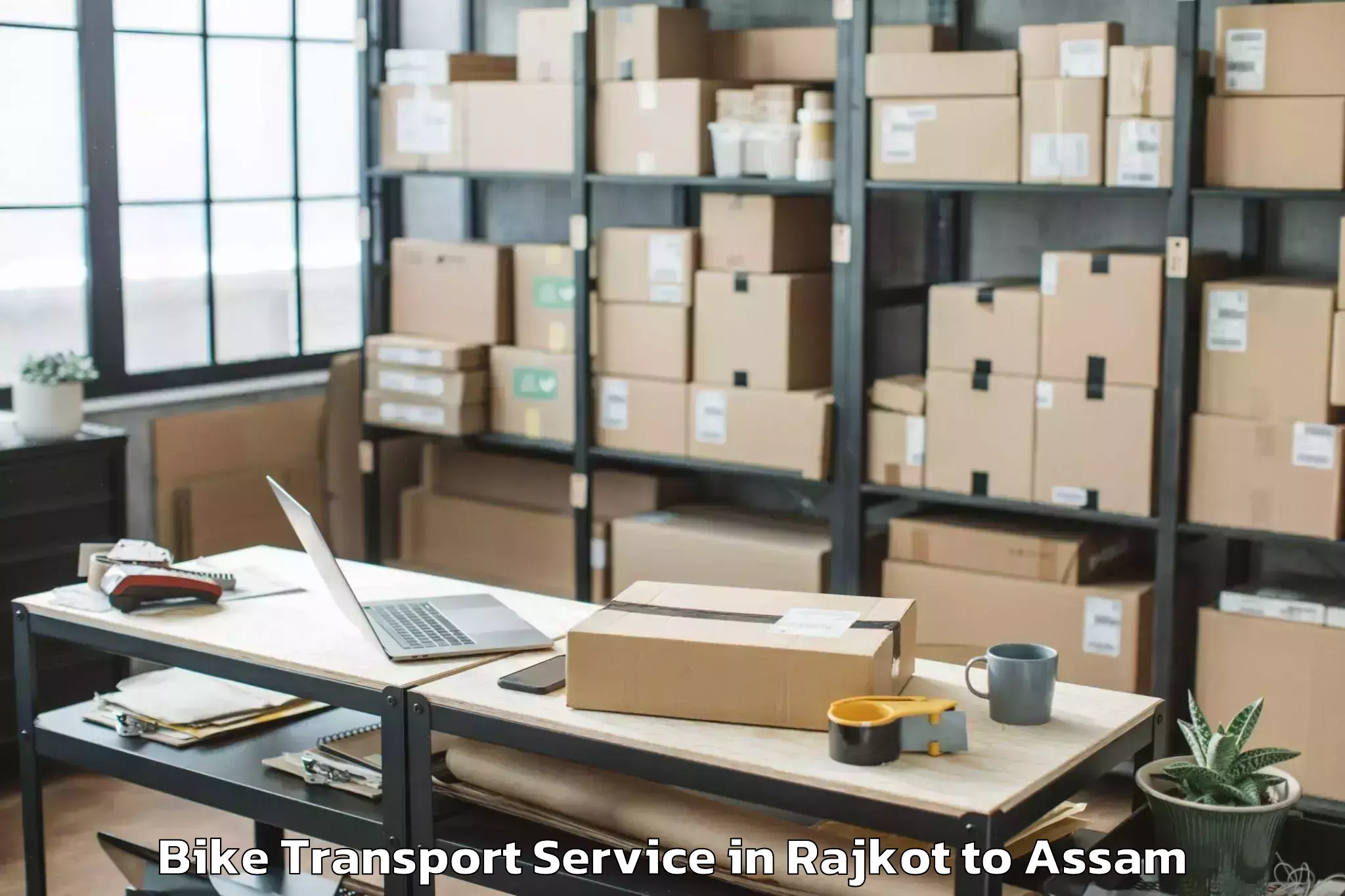 Book Rajkot to Haflong Bike Transport Online